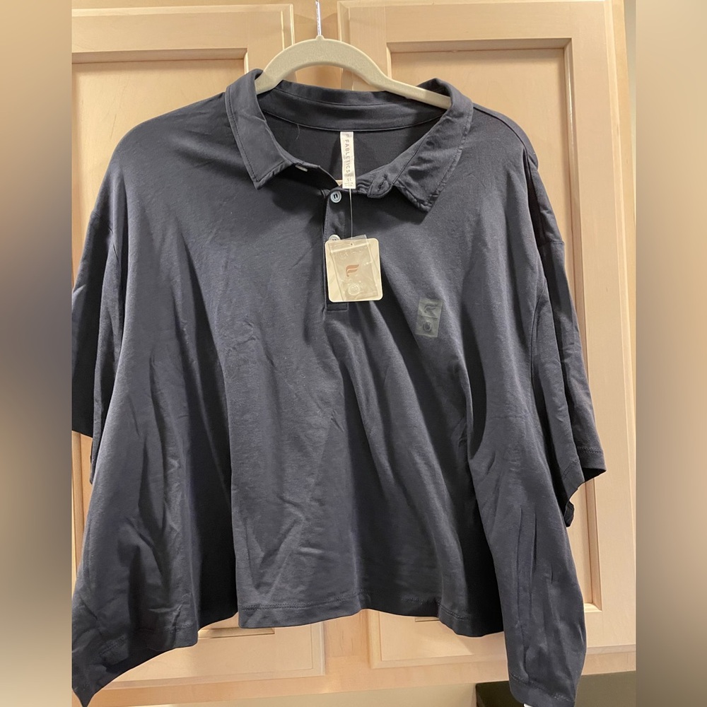 Fabletics Women's Short Sleeve Polo Tee in Navy